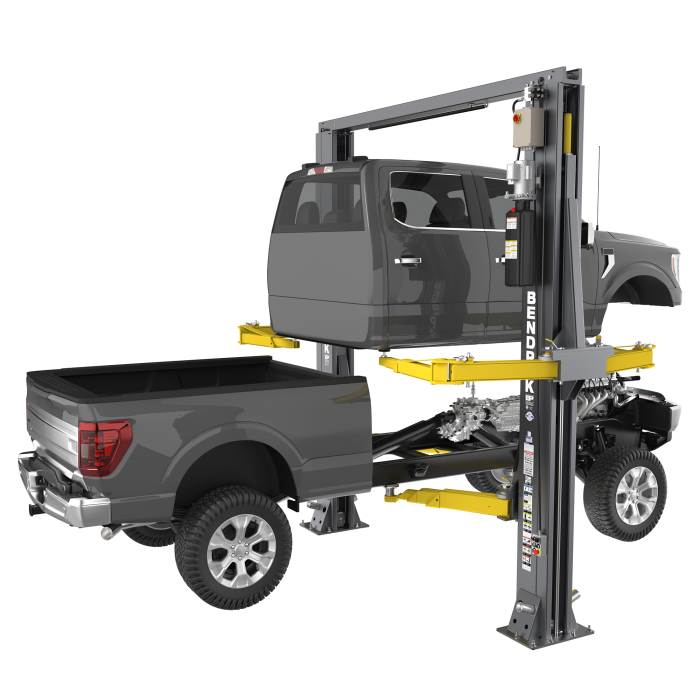 OctaFlex two-post lift performing cab-off truck service with full vehicle support system