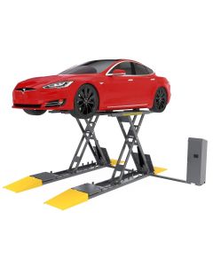 BendPak SP-7XE 5175424 full-rise scissor lift raising a red Tesla vehicle, showing long platforms, yellow approach ramps, and front-mounted power unit.