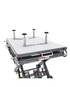 EVS fixture plate kit with four height-adjustable support pins mounted to the EVS4500 surface, engineered for accurate drivetrain and component placement