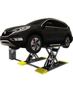 BendPak MDS-6LP 5175226 mid-rise open-center scissor lift raising a black crossover vehicle, showing extended lifting arms and compact platform design.