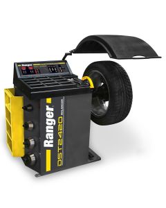 Ranger DST2420 5140156 wheel balancer front left view with mounted tire, hood raised, and digital control panel visible.