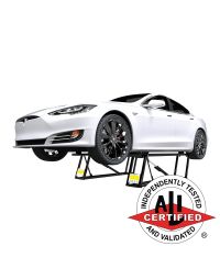 White Tesla Model S lifted by QuickJack 6000ELX portable car lift with ALI certification badge displayed in front.