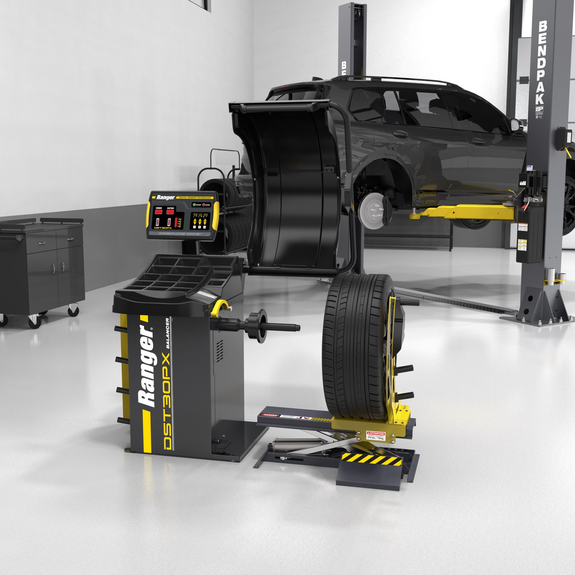 Ranger RWL175 wheel lift paired with a balancer in a professional shop, streamlining heavy wheel handling and installation.