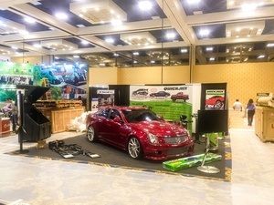 Setting up indoor booth for SEMA 2017