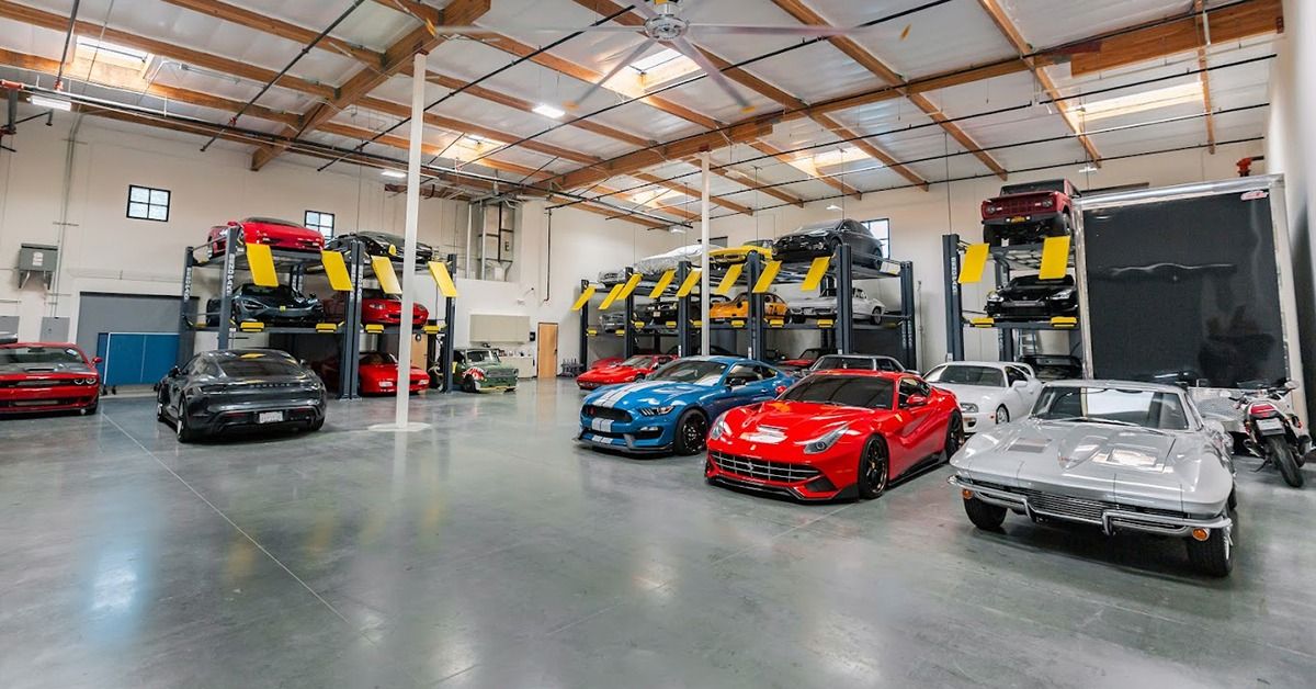 Storing multiple exotic cars inside using a triple stacker parking lift